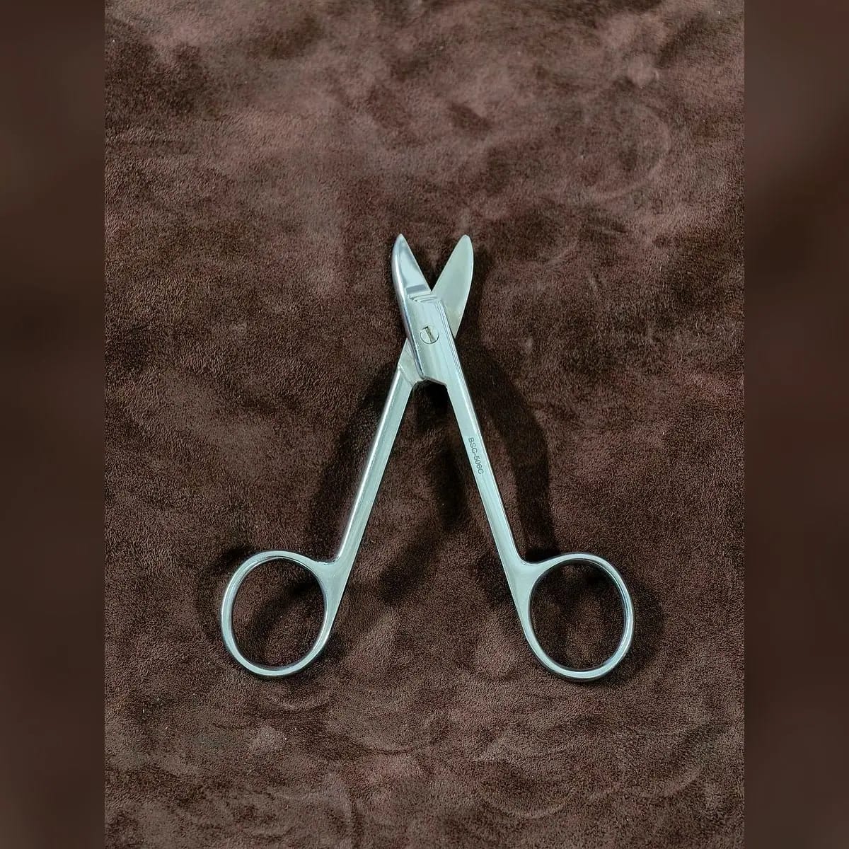 Crown Scissors by Morbella Instruments — blades open, photographed at the Sialkot workshop