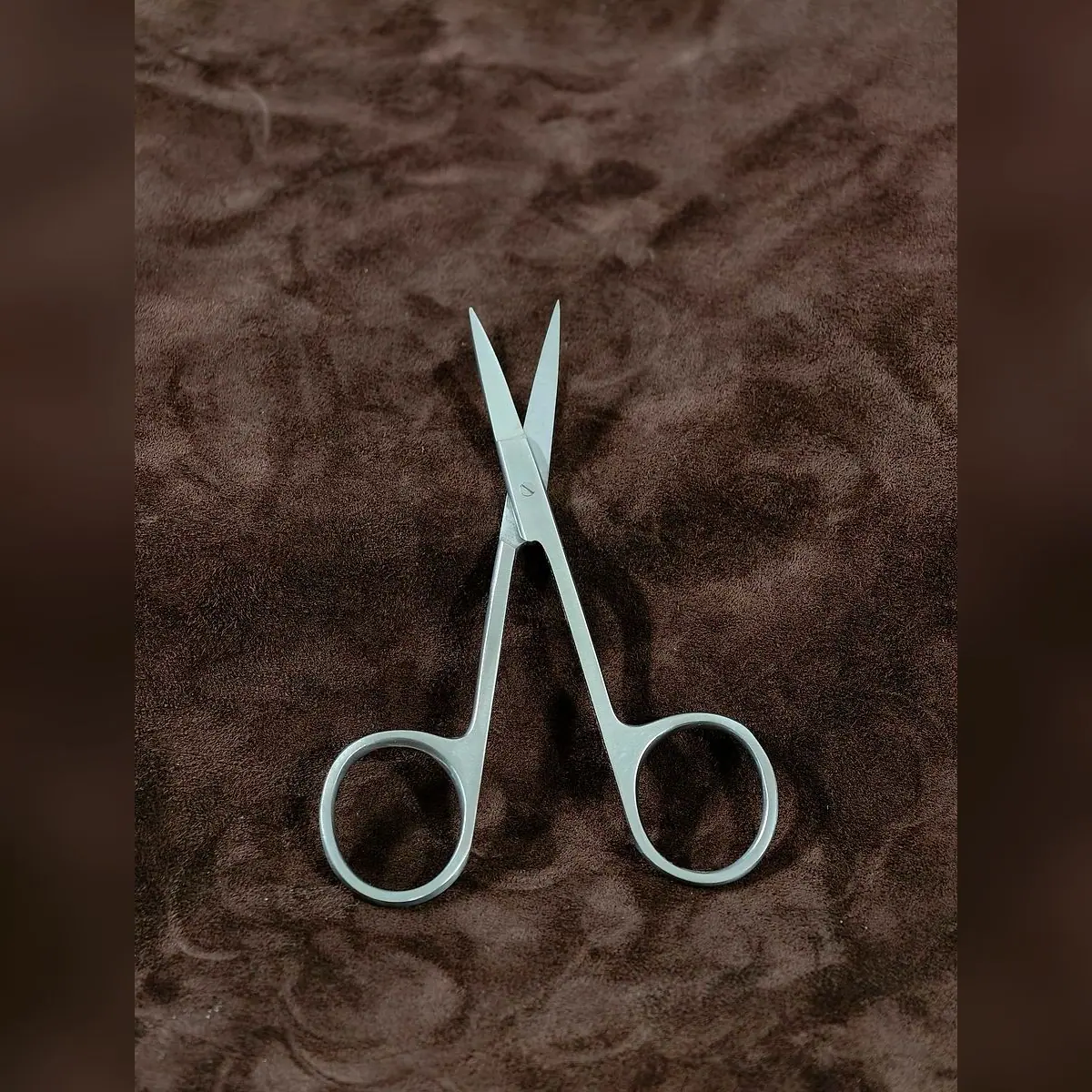 Iris Scissors Plain, Single-Use by Morbella Instruments — blades open, photographed at the Sialkot workshop