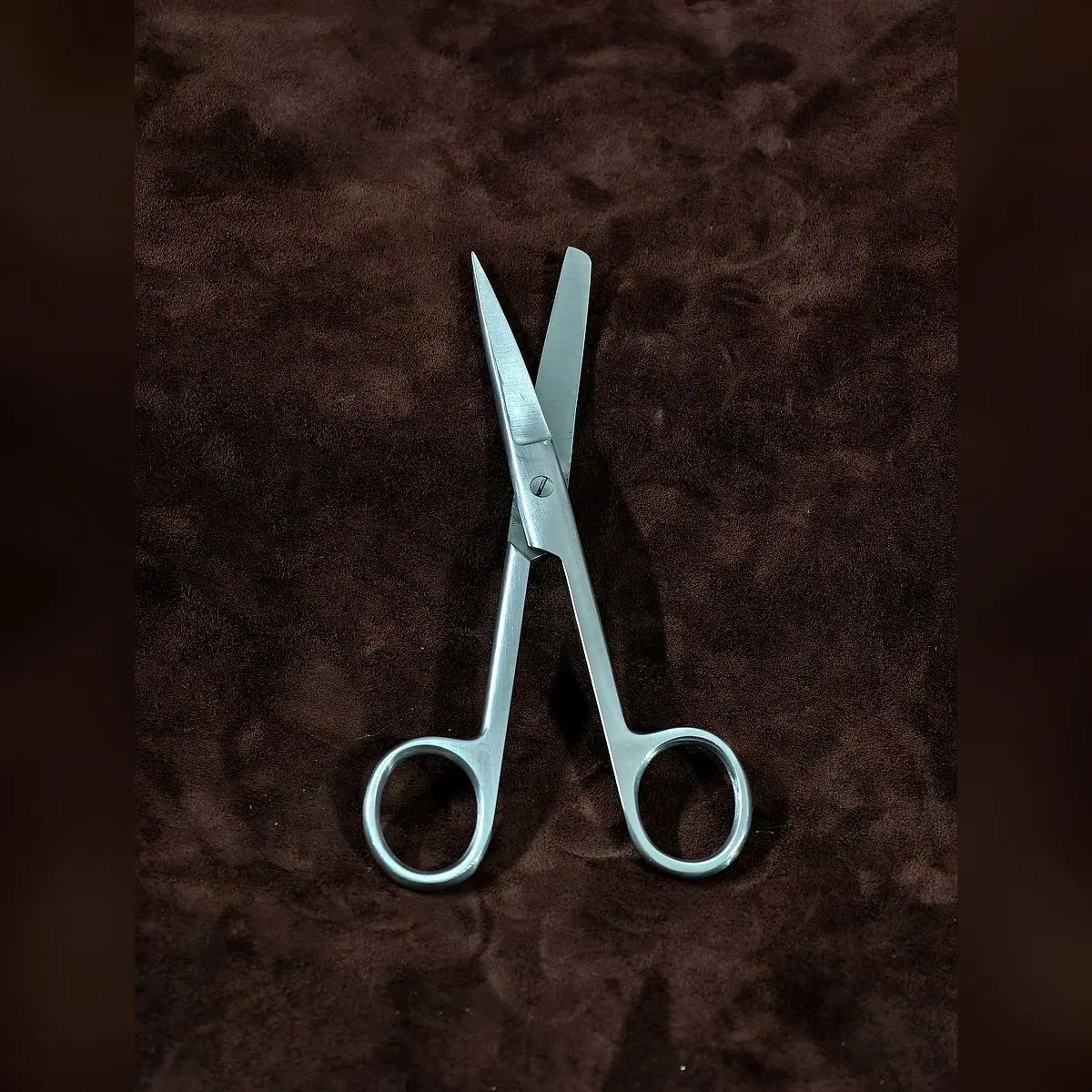 Operating Scissors Sharp/Blunt by Morbella Instruments — blades open, photographed at the Sialkot workshop