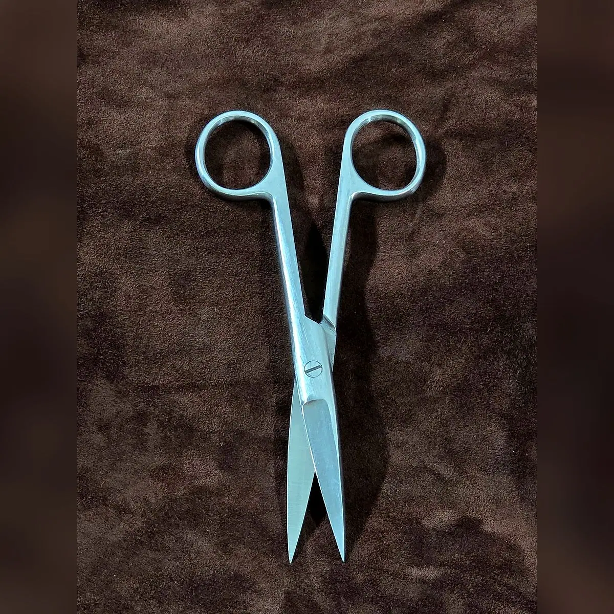 Operating Scissors Sharp/Sharp by Morbella Instruments — blades open, photographed at the Sialkot workshop