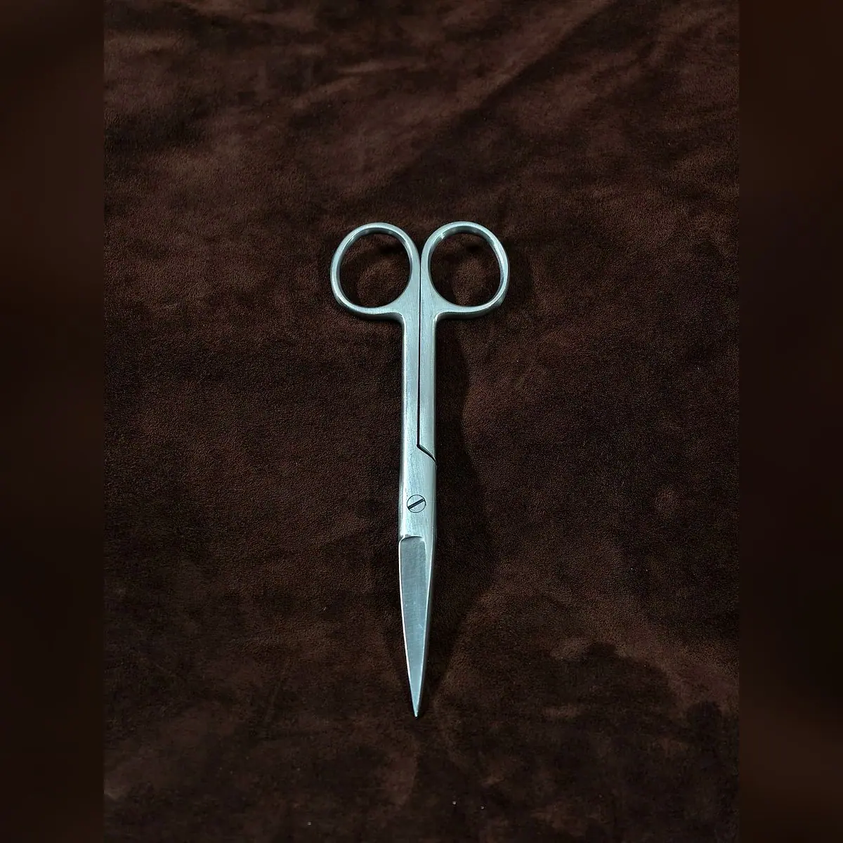 Operating Scissors Sharp/Sharp by Morbella Instruments — closed, shorter size, photographed at the Sialkot workshop