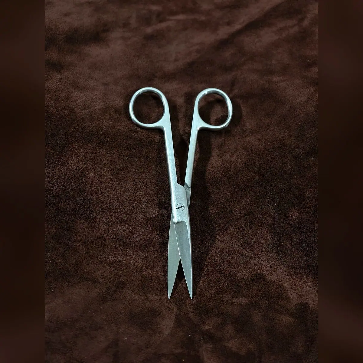 Operating Scissors Sharp/Sharp by Morbella Instruments — blades open, shorter size, photographed at the Sialkot workshop