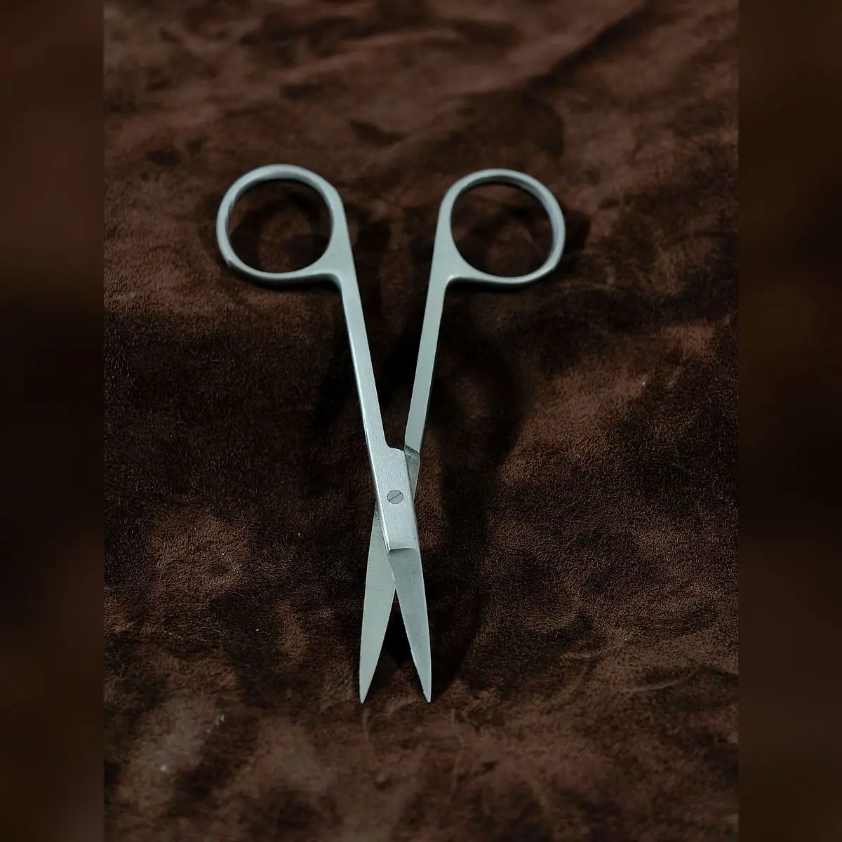 Iris Scissors Plain, Single-Use by Morbella Instruments — blades open, front view, photographed at the Sialkot workshop