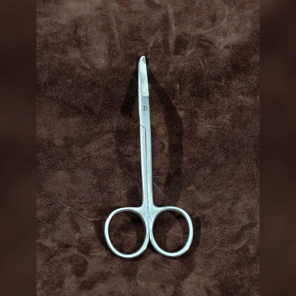 Stitch Scissors, Single-Use by Morbella Instruments — closed, front view, photographed at the Sialkot workshop